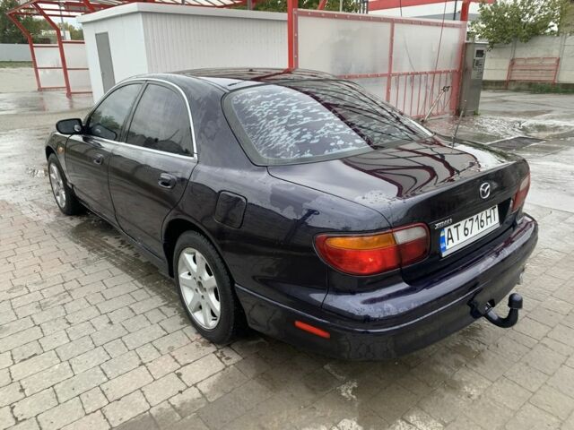 Синий Мазда Кседос 9, объемом двигателя 2 л и пробегом 407 тыс. км за 1950 $, фото 3 на Automoto.ua