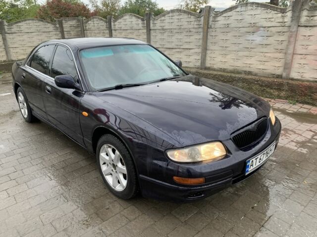 Синий Мазда Кседос 9, объемом двигателя 2 л и пробегом 407 тыс. км за 1950 $, фото 1 на Automoto.ua