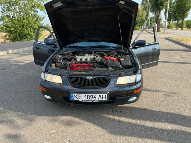 Синий Мазда Кседос 9, объемом двигателя 2.5 л и пробегом 420 тыс. км за 1800 $, фото 2 на Automoto.ua