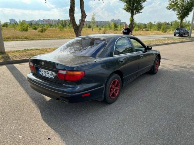 Синий Мазда Кседос 9, объемом двигателя 2.5 л и пробегом 420 тыс. км за 1800 $, фото 4 на Automoto.ua