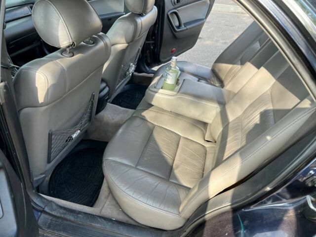 Синий Мазда Кседос 9, объемом двигателя 2.5 л и пробегом 420 тыс. км за 1800 $, фото 3 на Automoto.ua