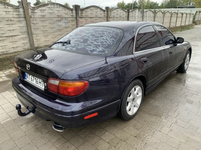 Синий Мазда Кседос 9, объемом двигателя 2 л и пробегом 407 тыс. км за 1950 $, фото 2 на Automoto.ua