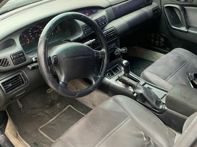 Синий Мазда Кседос 9, объемом двигателя 2 л и пробегом 407 тыс. км за 1950 $, фото 4 на Automoto.ua