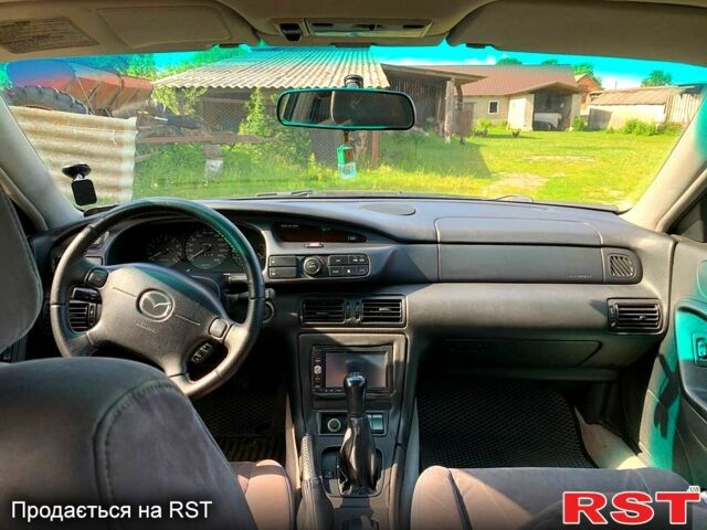 Синий Мазда Кседос 9, объемом двигателя 2 л и пробегом 350 тыс. км за 3300 $, фото 8 на Automoto.ua