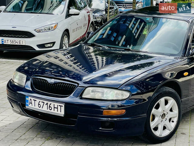 Синій Мазда Кседос 9, об'ємом двигуна 2 л та пробігом 405 тис. км за 1600 $, фото 2 на Automoto.ua