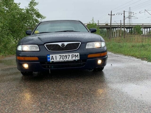 Синий Мазда Кседос 9, объемом двигателя 2.5 л и пробегом 385 тыс. км за 2200 $, фото 2 на Automoto.ua