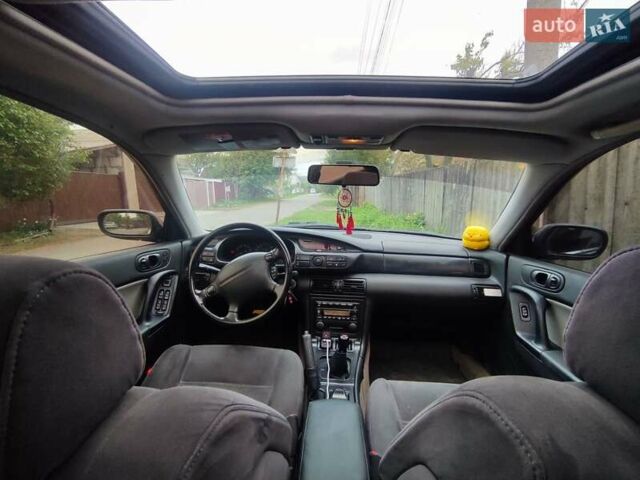 Синий Мазда Кседос 9, объемом двигателя 2.5 л и пробегом 380 тыс. км за 2100 $, фото 17 на Automoto.ua