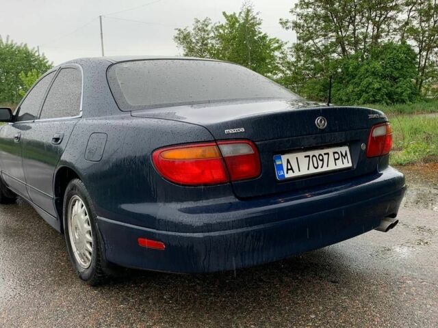 Синий Мазда Кседос 9, объемом двигателя 2.5 л и пробегом 385 тыс. км за 2200 $, фото 5 на Automoto.ua