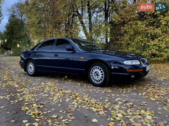 Синий Мазда Кседос 9, объемом двигателя 2.5 л и пробегом 380 тыс. км за 2100 $, фото 3 на Automoto.ua