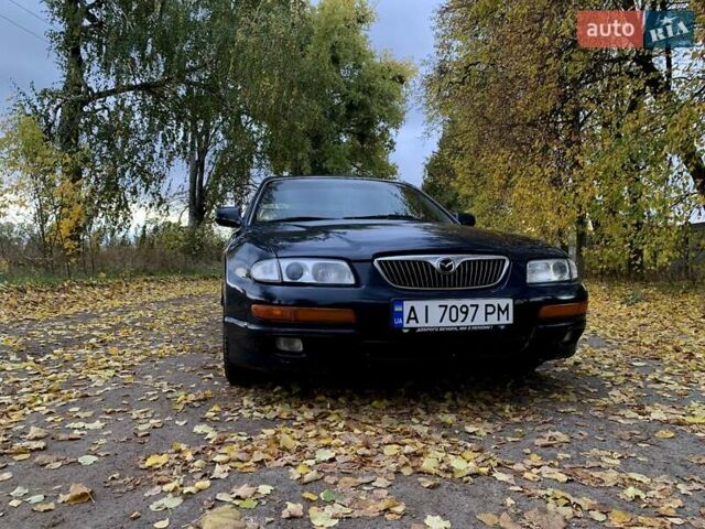 Мазда Кседос 9 1994 в Борисполе на Automoto.ua Синий Мазда Кседос 9, объемом двигателя 2.5 л и пробегом 330 тыс. км за 2500 $, фото 4 на Automoto.ua
