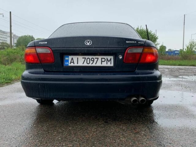 Синий Мазда Кседос 9, объемом двигателя 2.5 л и пробегом 385 тыс. км за 2200 $, фото 7 на Automoto.ua