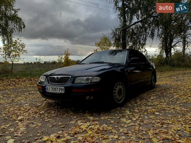 Мазда Кседос 9 1994 в Борисполе на Automoto.ua Синий Мазда Кседос 9, объемом двигателя 2.5 л и пробегом 330 тыс. км за 2500 $, фото 1 на Automoto.ua