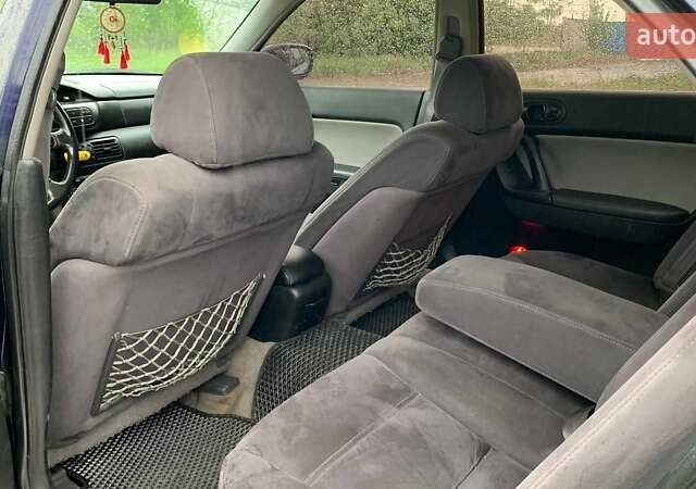 Синий Мазда Кседос 9, объемом двигателя 2.5 л и пробегом 380 тыс. км за 2100 $, фото 16 на Automoto.ua