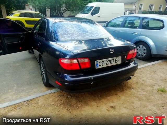 Синій Мазда Кседос 9, об'ємом двигуна 2.5 л та пробігом 378 тис. км за 1700 $, фото 1 на Automoto.ua