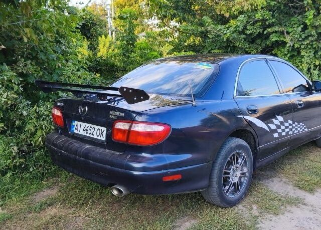 Синий Мазда Кседос 9, объемом двигателя 2.5 л и пробегом 288 тыс. км за 2700 $, фото 3 на Automoto.ua