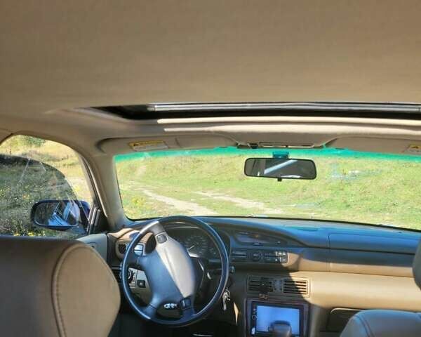 Синий Мазда Кседос 9, объемом двигателя 2.5 л и пробегом 328 тыс. км за 2450 $, фото 9 на Automoto.ua