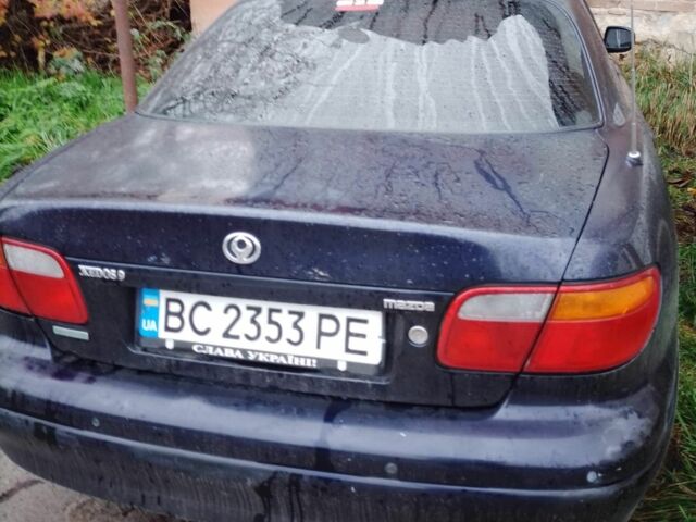 Синий Мазда Кседос 9, объемом двигателя 2.3 л и пробегом 250 тыс. км за 2200 $, фото 2 на Automoto.ua