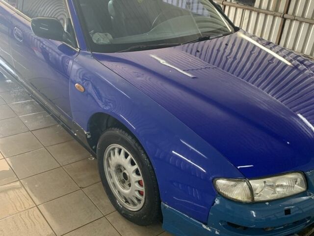 Синий Мазда Кседос 9, объемом двигателя 0 л и пробегом 200 тыс. км за 800 $, фото 9 на Automoto.ua