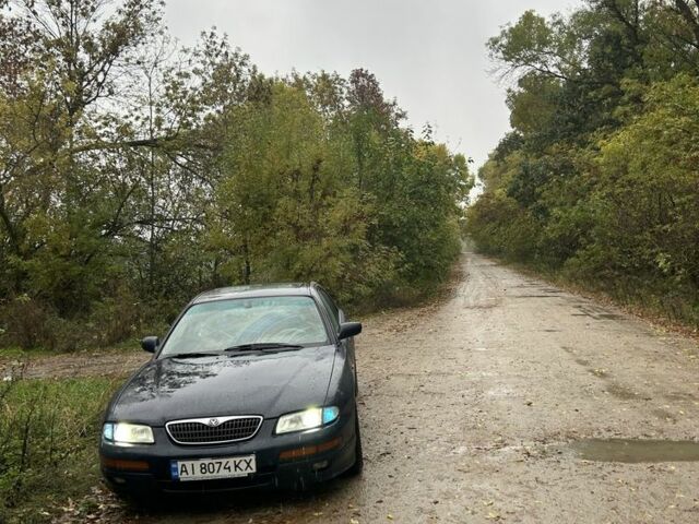 Синій Мазда Кседос 9, об'ємом двигуна 2.3 л та пробігом 3 тис. км за 2100 $, фото 4 на Automoto.ua