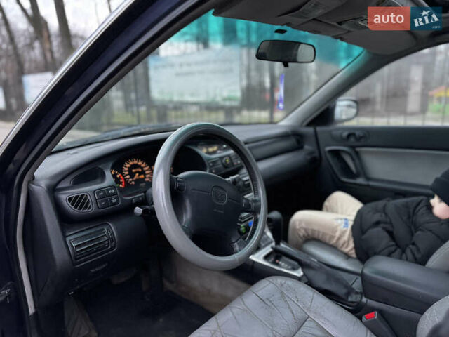 Синий Мазда Кседос 9, объемом двигателя 2.26 л и пробегом 185 тыс. км за 2200 $, фото 21 на Automoto.ua