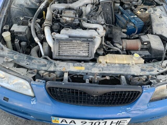 Синий Мазда Кседос 9, объемом двигателя 0 л и пробегом 200 тыс. км за 800 $, фото 17 на Automoto.ua