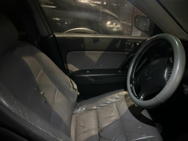 Синій Мазда Кседос 9, об'ємом двигуна 2.3 л та пробігом 3 тис. км за 2100 $, фото 2 на Automoto.ua