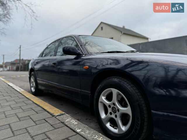 Синий Мазда Кседос 9, объемом двигателя 2.26 л и пробегом 185 тыс. км за 2200 $, фото 4 на Automoto.ua