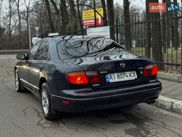 Синий Мазда Кседос 9, объемом двигателя 2.26 л и пробегом 185 тыс. км за 2200 $, фото 2 на Automoto.ua