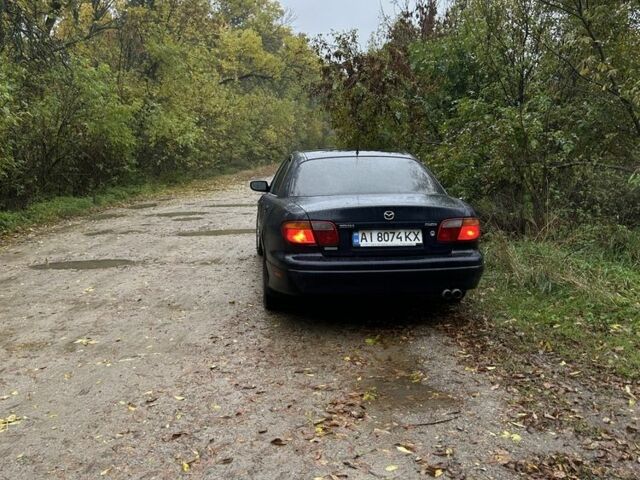 Синій Мазда Кседос 9, об'ємом двигуна 2.3 л та пробігом 3 тис. км за 2100 $, фото 6 на Automoto.ua