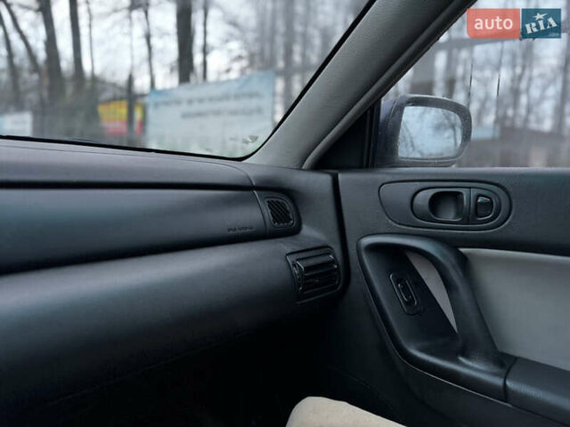 Синий Мазда Кседос 9, объемом двигателя 2.26 л и пробегом 185 тыс. км за 2200 $, фото 15 на Automoto.ua