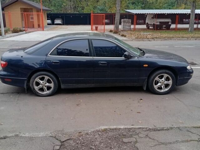 Синій Мазда Кседос 9, об'ємом двигуна 2.5 л та пробігом 252 тис. км за 954 $, фото 2 на Automoto.ua