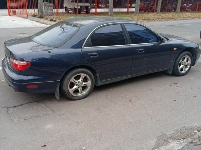 Синій Мазда Кседос 9, об'ємом двигуна 2.5 л та пробігом 252 тис. км за 954 $, фото 3 на Automoto.ua