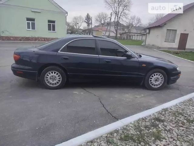 Синий Мазда Кседос 9, объемом двигателя 2.3 л и пробегом 250 тыс. км за 2200 $, фото 5 на Automoto.ua
