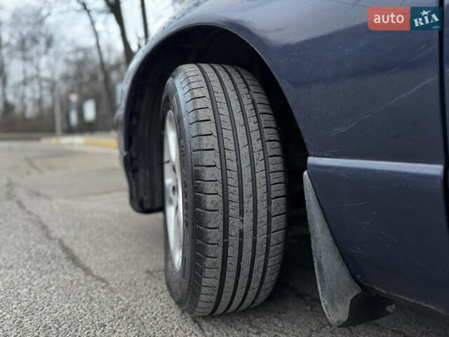 Синий Мазда Кседос 9, объемом двигателя 2.26 л и пробегом 185 тыс. км за 2200 $, фото 5 на Automoto.ua