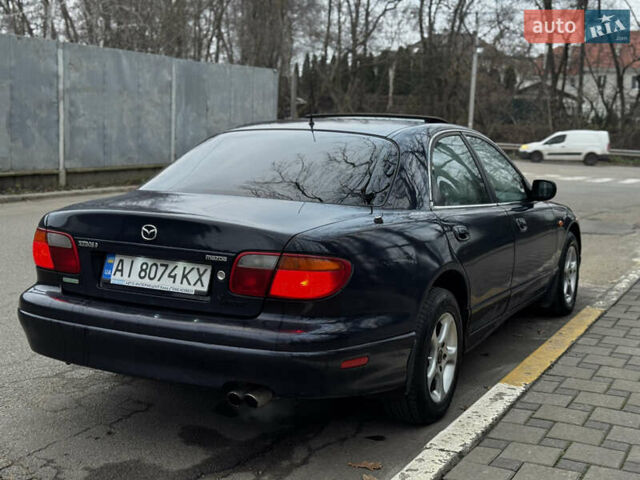 Синий Мазда Кседос 9, объемом двигателя 2.26 л и пробегом 185 тыс. км за 2200 $, фото 1 на Automoto.ua