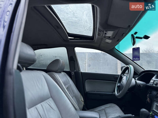 Синий Мазда Кседос 9, объемом двигателя 2.26 л и пробегом 185 тыс. км за 2200 $, фото 13 на Automoto.ua