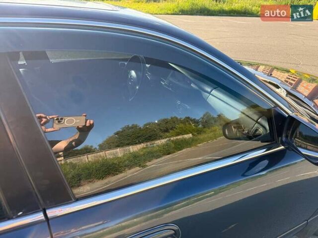 Синий Мазда Кседос 9, объемом двигателя 2.5 л и пробегом 285 тыс. км за 3200 $, фото 10 на Automoto.ua