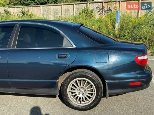 Синий Мазда Кседос 9, объемом двигателя 2.5 л и пробегом 285 тыс. км за 3200 $, фото 73 на Automoto.ua