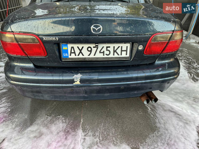Синий Мазда Кседос 9, объемом двигателя 2.5 л и пробегом 288 тыс. км за 3500 $, фото 8 на Automoto.ua