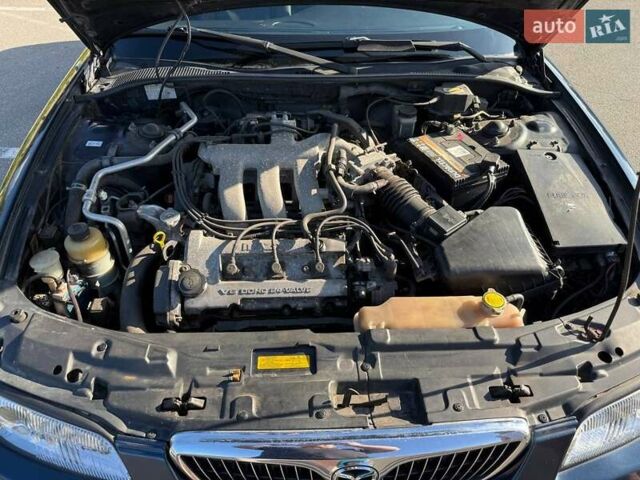 Синий Мазда Кседос 9, объемом двигателя 2.5 л и пробегом 285 тыс. км за 3200 $, фото 60 на Automoto.ua