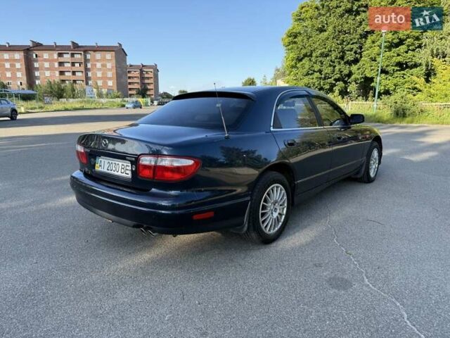 Синий Мазда Кседос 9, объемом двигателя 2.5 л и пробегом 285 тыс. км за 3200 $, фото 3 на Automoto.ua