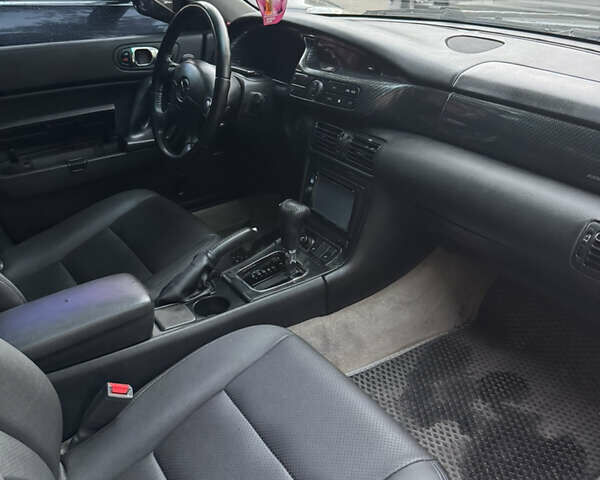 Синий Мазда Кседос 9, объемом двигателя 2.5 л и пробегом 288 тыс. км за 3500 $, фото 3 на Automoto.ua