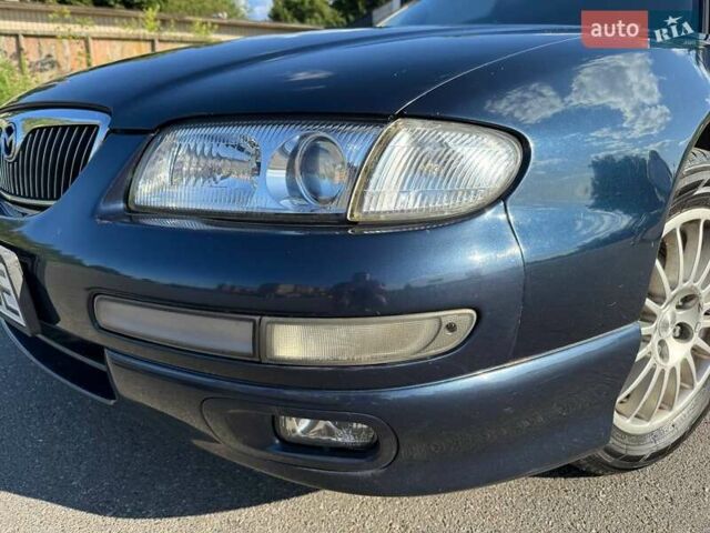 Синий Мазда Кседос 9, объемом двигателя 2.5 л и пробегом 285 тыс. км за 3200 $, фото 72 на Automoto.ua