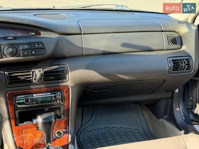 Синий Мазда Кседос 9, объемом двигателя 2.5 л и пробегом 285 тыс. км за 3200 $, фото 32 на Automoto.ua