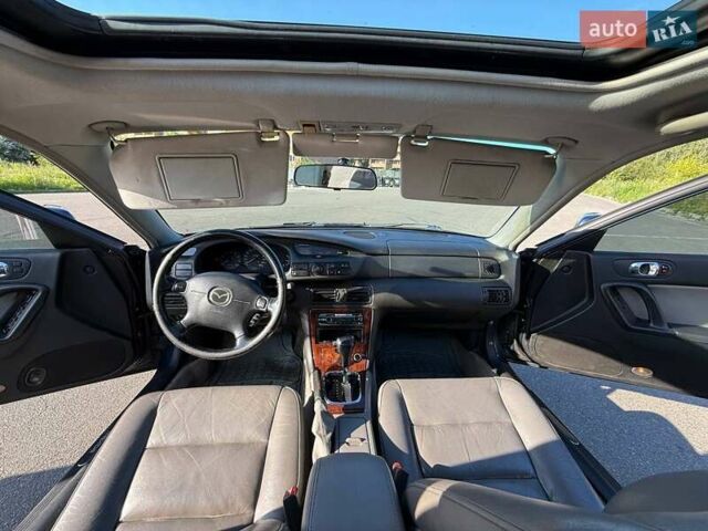 Синий Мазда Кседос 9, объемом двигателя 2.5 л и пробегом 285 тыс. км за 3200 $, фото 35 на Automoto.ua