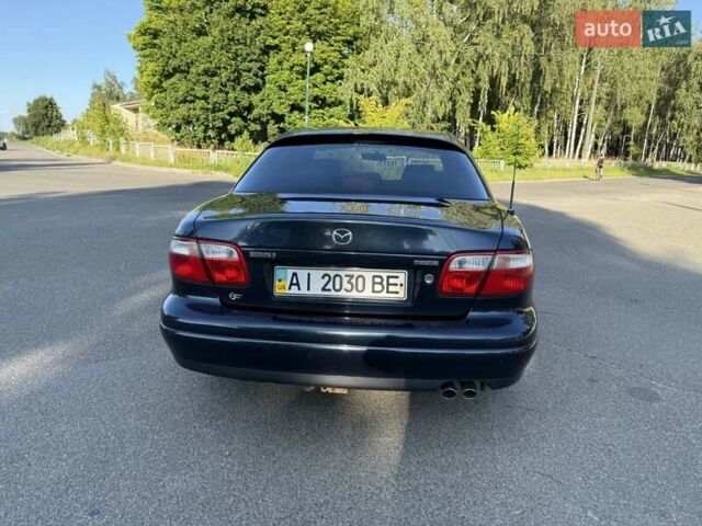 Синий Мазда Кседос 9, объемом двигателя 2.5 л и пробегом 285 тыс. км за 3200 $, фото 4 на Automoto.ua