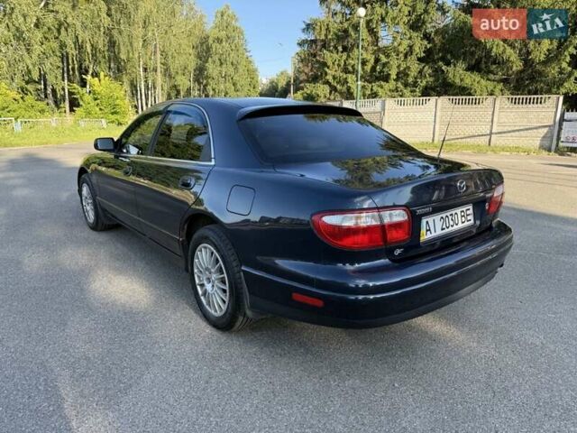 Синий Мазда Кседос 9, объемом двигателя 2.5 л и пробегом 285 тыс. км за 3200 $, фото 5 на Automoto.ua