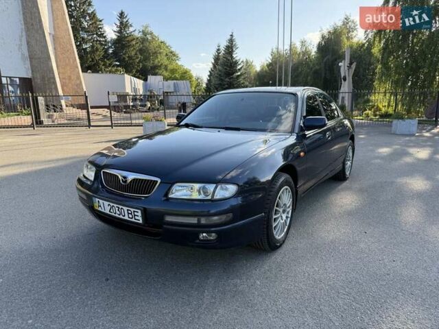 Синий Мазда Кседос 9, объемом двигателя 2.5 л и пробегом 285 тыс. км за 3200 $, фото 6 на Automoto.ua