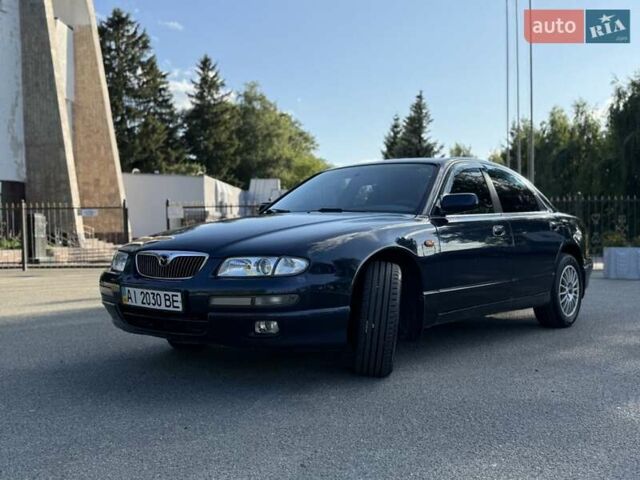Синий Мазда Кседос 9, объемом двигателя 2.5 л и пробегом 285 тыс. км за 3200 $, фото 1 на Automoto.ua