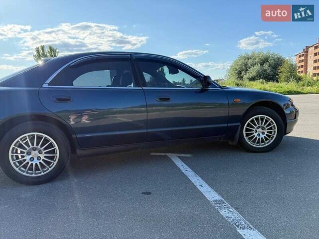Синий Мазда Кседос 9, объемом двигателя 2.5 л и пробегом 285 тыс. км за 3200 $, фото 81 на Automoto.ua